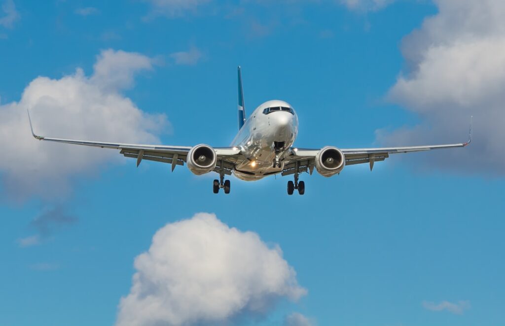 A close-up of a small aircraft with a clear blue sky in the background, symbolizing aviation and insurance.
